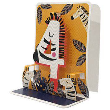Four small Pictura pop-up cards displayed with intricate paper designs and vibrant colors on a neutral background.